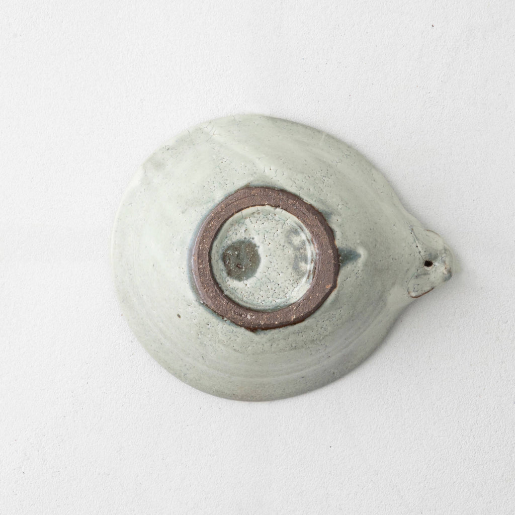 Handmade Japanese ceramic bowl base, circular mark with brown ring and speckled glaze