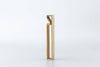 Brass bottle opener with upright rectangular frame and curved pry tip