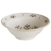 Off-white Japanese porcelain serving bowl with blue floral and speckle pattern