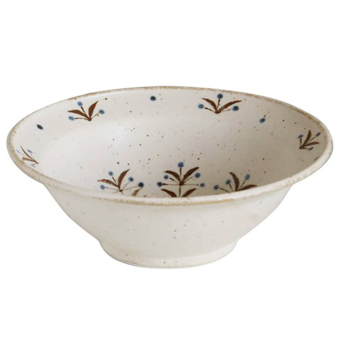 Off-white Japanese porcelain serving bowl with blue floral and speckle pattern