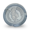 Blue glass ashtray, angled view, embossed character and circular text on top