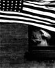 American photography print with American flag and person in window