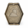 Hexagonal bronze ashtray with engraved bust and decorative border