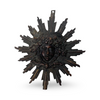 Sunburst face pendant with dark metal rays and central face detail