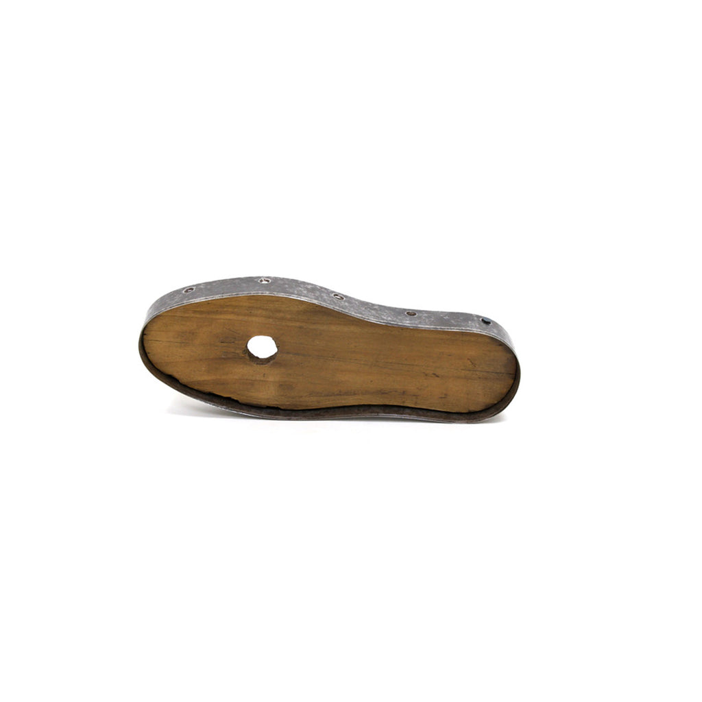 Shoe mold base with wooden sole insert and dark metal edge, view from bottom