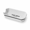 White ceramic ashtray with black trim; JULES VERNE logo