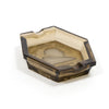 Dark amber glass ashtray with faceted hexagonal rim