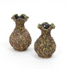 Set of two speckled ceramic vases with flared openings and dark glossy interiors
