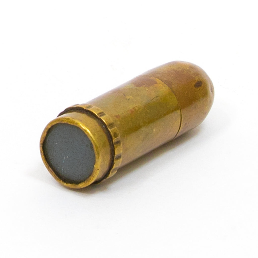 Brass bullet casing with primer end, cylindrical metal shell