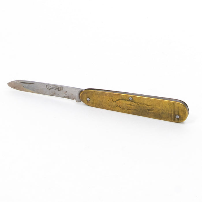 Antique utility knife with brass-toned handle and engraved blade