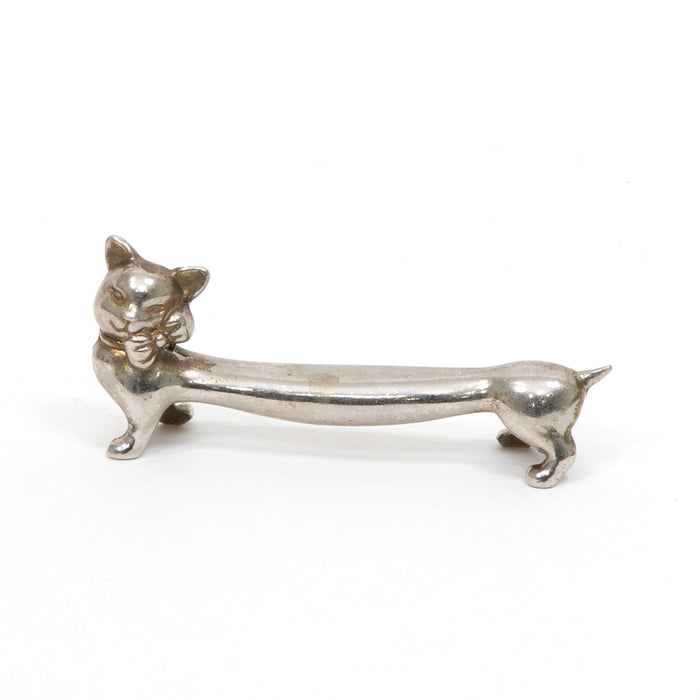Vintage French cat-shaped knife rest, silver-tone metal figurine base