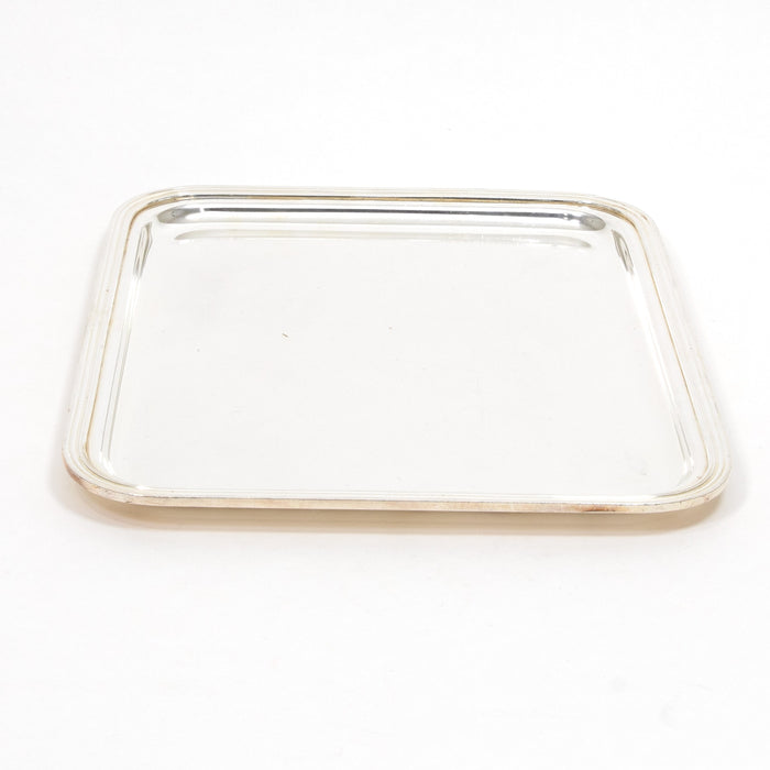 Vintage silver hotel service tray with raised rim