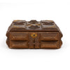 Decorative wooden trinket box with brass medallion and geometric inlay, closed