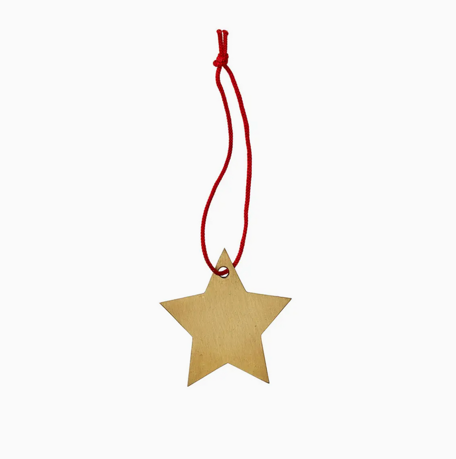 Brass star ornament with red cord loop for hanging
