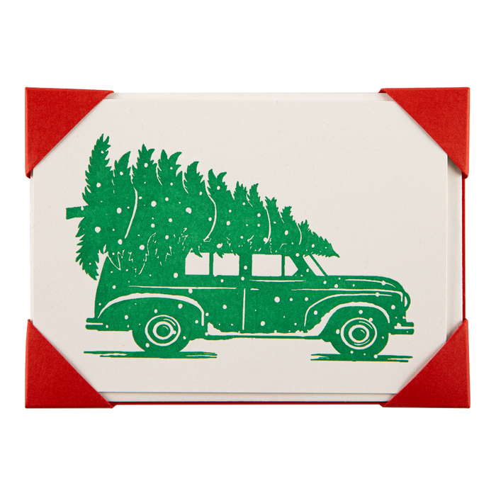 Christmas notelet card with green vintage truck illustration and red corner envelope
