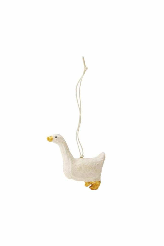 Paper mache duck ornament with cream body and yellow feet on white cord