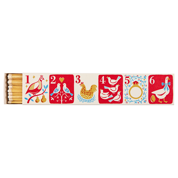 Christmas safety matchbox with long wooden matches, numbered 1–6 holiday illustrations