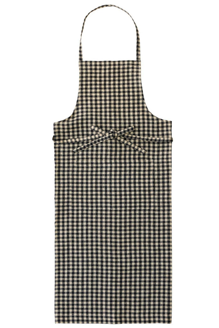 Black-and-white gingham linen apron with neck strap and chest bow