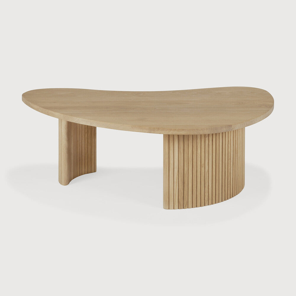 Oak boomerang coffee table with oval tabletop and two visible ribbed end legs.