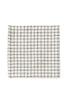 Jenn linen napkin featuring a blue check grid pattern